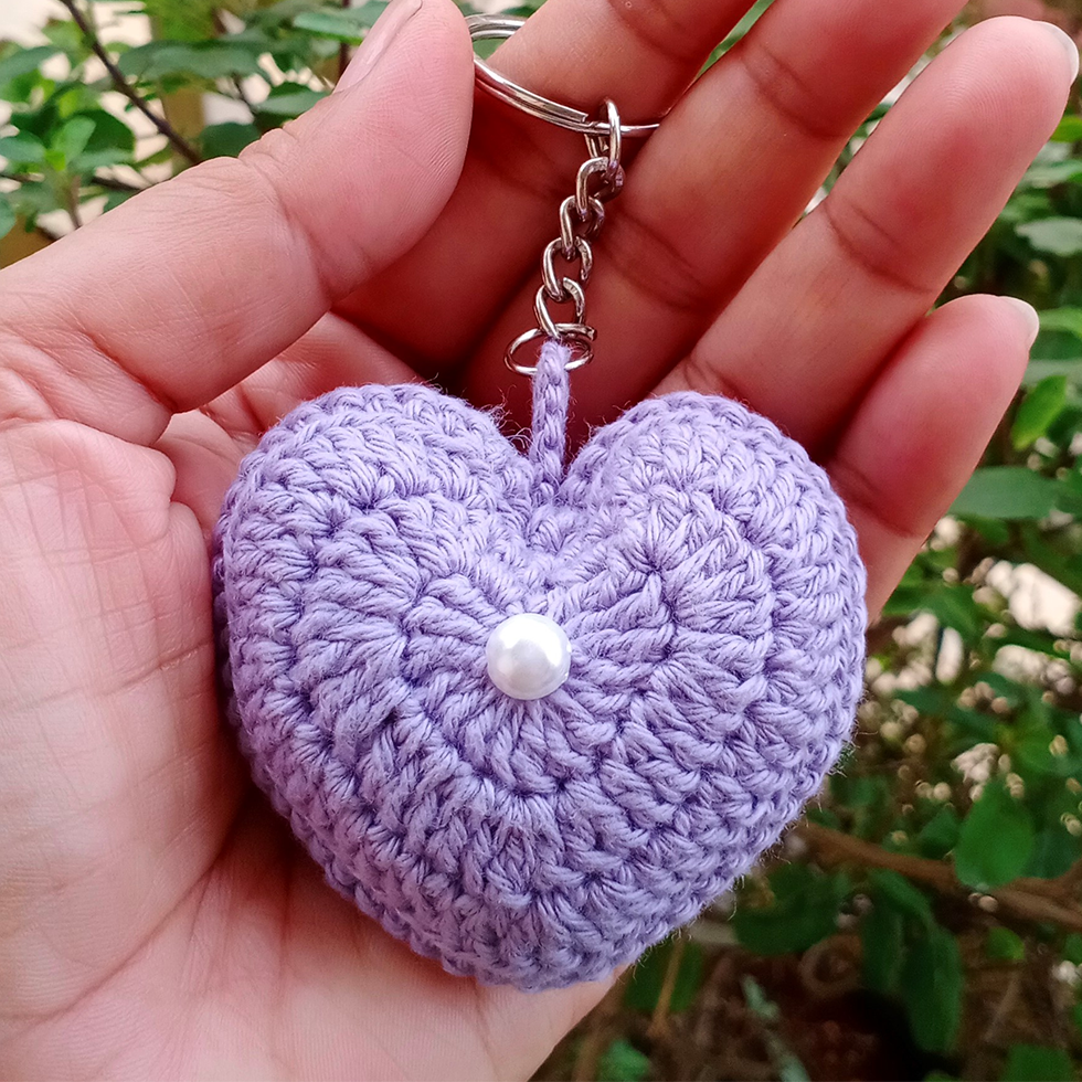 Handmade crochet heart-shaped keychain in vibrant red, perfect for gifting or adding a touch of love to your accessories. Soft, durable, and beautifully crafted.