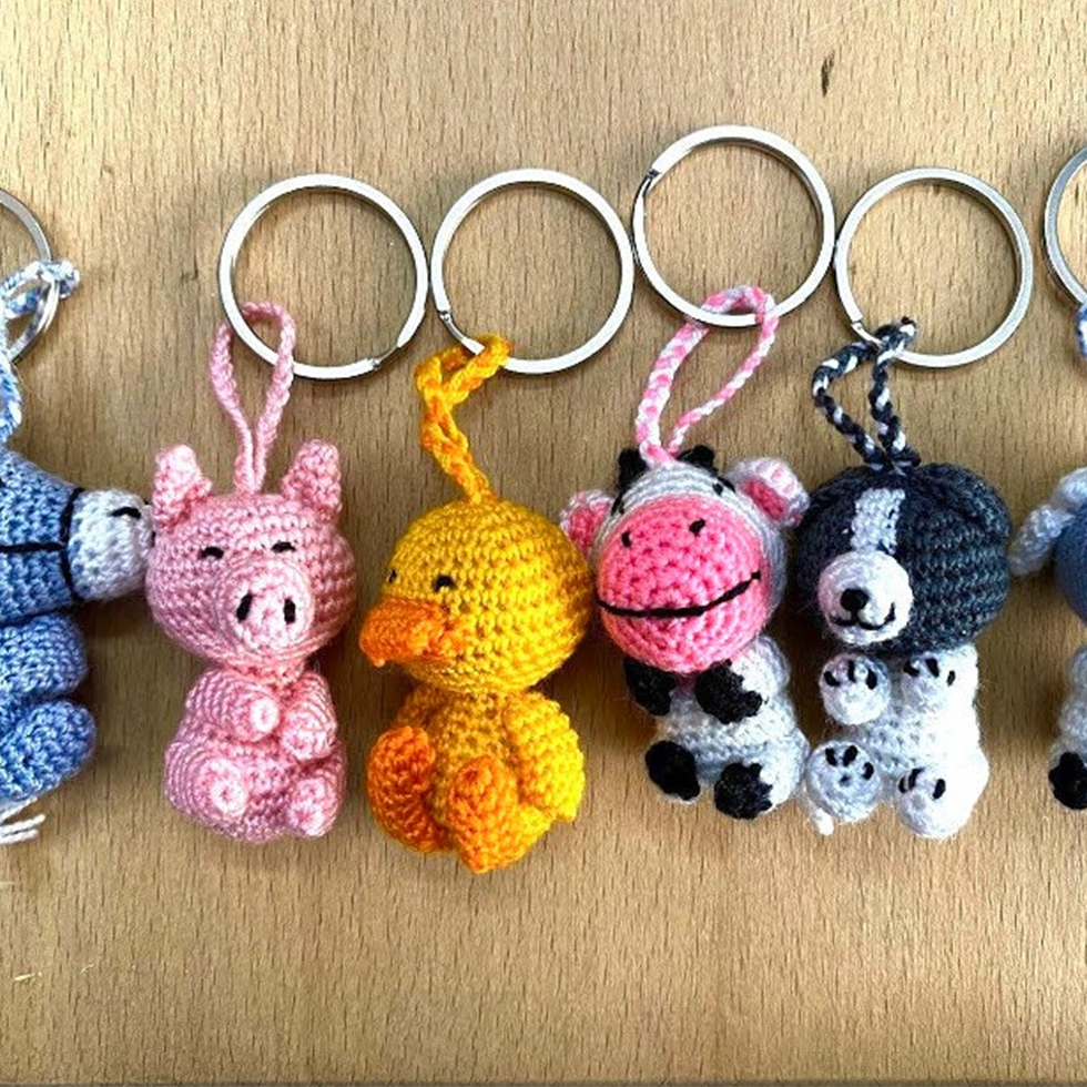 Adorable handmade crochet mini animal keychains featuring cute designs like pandas, elephants, and bears. Perfect for gifting or personalizing your keys and bags.